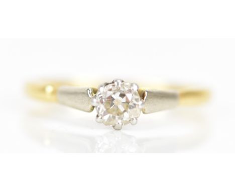 A yellow and white gold diamond engagement ring, the old cut diamond in an eight claw setting, 4.2mm, ring size N, 2.1 gramsI