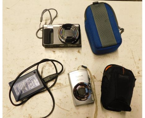 Digital cameras, comprising a Panasonic Lumix L, in carry case, and a Canon IXUS 950IS charger. (a quantity)