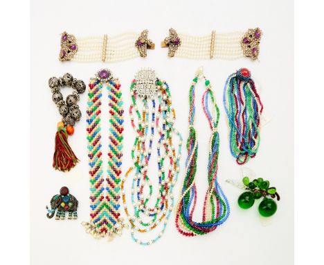 Comprising four gripoix glass and pearl necklaces, two faux pearl and metal multi-strand bracelets, a pierced metal bracelet 