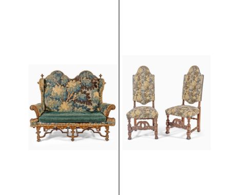 The settee with double-arched pack upholstered in 17th Century verdure tapestry, the chairs upholstered in machine-made tapes