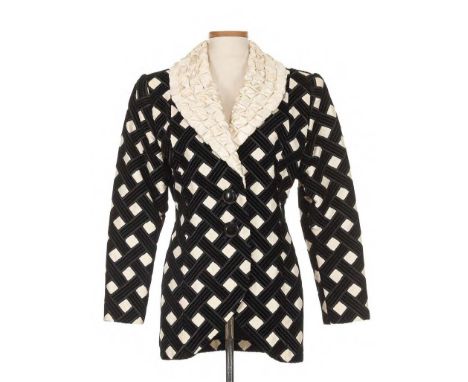 The v-neck with button front closure (no size); a black silk velvet and ivory faille lattice pattern satin jacket (no size) a
