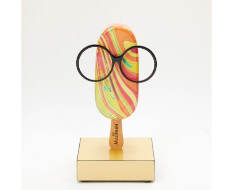Circa 2019Realistically rendered in tie-dye colors with applied black rim eyeglasses, almost certainly made in honor of Iris 