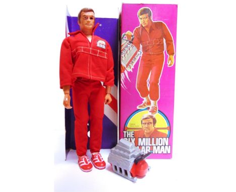 A DENYS FISHER COLONEL STEVE AUSTIN 'THE SIX MILLION DOLLAR MAN' ACTION FIGURE  with wide-angle lens eye and engine block acc