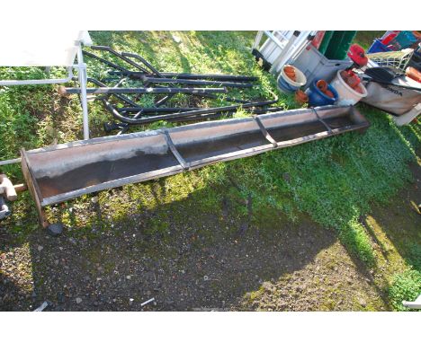 A galvanised feed sheep trough - 9' long.