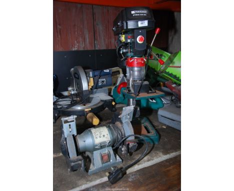 A 'Parkside' pillar drill bench vice and a 'Performance pro' bench grinder.