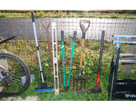 A log-splitter, spirit level and shears, etc.