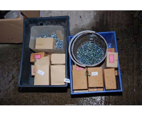 Two boxes M8 nuts and bolts, 2½" straight edge screwdriver heads on them.