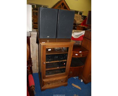 A JVC music centre including speakers, in a music 'Ercol' cupboard - 27" wide x  19" x 38" high.