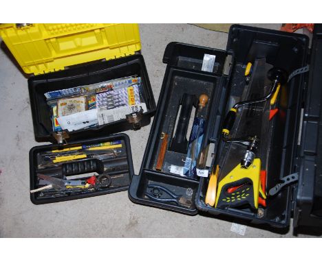 A selection of wood saws, breast drills and tool box of metal and wood bits.