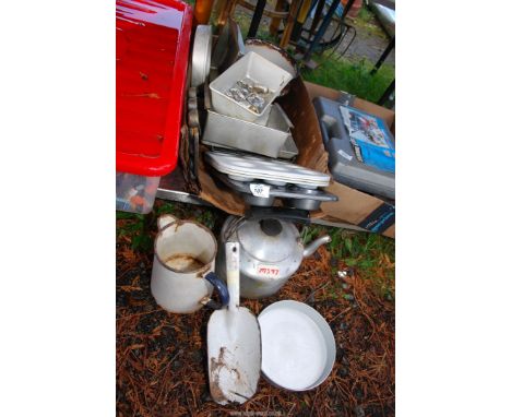 An AGA kettle, enamel shovel and cake tins, etc.