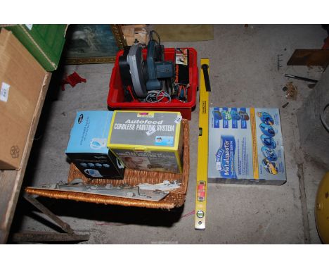 A picnic hamper basket, painting system, kettle, old drill, rip saw, Black and Decker air gun.