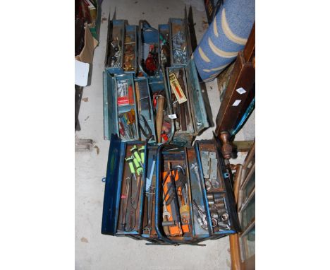 Three cantilever tool boxes and contents, hinges, screwdrivers and sockets, etc.