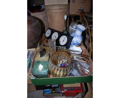 Two boxes containing table lamps, old brass music stand, clock barometer, thermometer unit vases, etc.