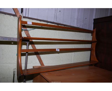 An 'Ercol' two shelf wall mounted plate rack - 38" wide x 19" high.