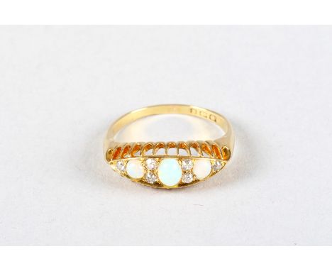 Ladies 18 carat opal and diamond ring, three oval opals interspaced with six small old cut diamonds 