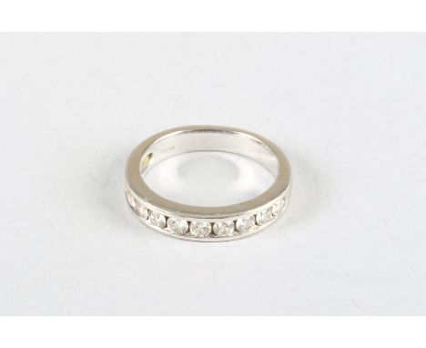 18 carat white gold half diamond eternity ring, eleven set brilliant cut diamonds 
