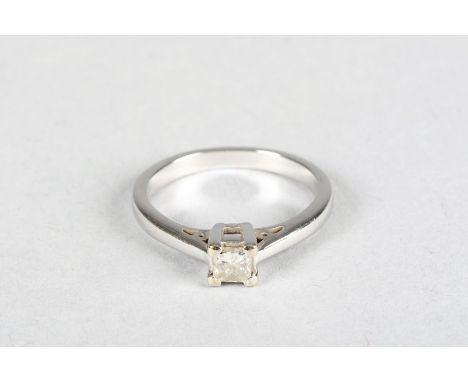 Boxed 18 carat white gold solitaire diamond ring, 0.33 carat princess cut diamond 