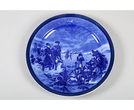 Cauldon blue and white wall plate, decorated with a transfer print of Napoleon with his troops, base incised Cauldon. 33cm di