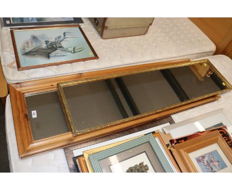 A pine framed wall mirror together with a gilt framed wall mirror