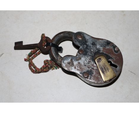 A vintage padlock and key