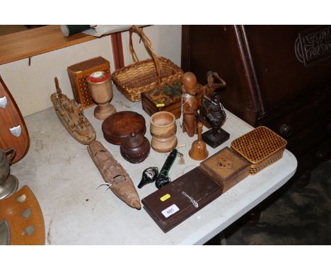A collection of wooden items to include scales; figures; trinket boxes; model boat etc