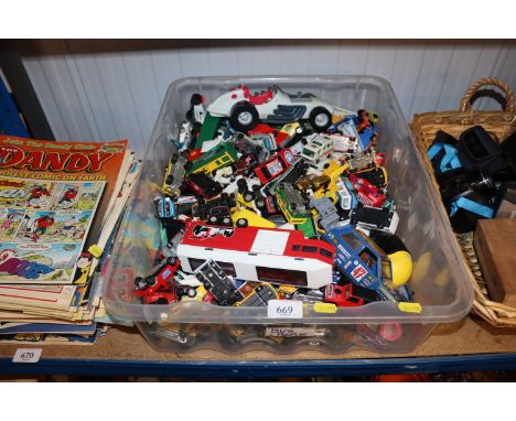 A box containing various die cast vehicles to include Matchbox, Corgi etc.