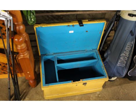 A painted wooden tool chest with hinged lid and internal wooden trays 