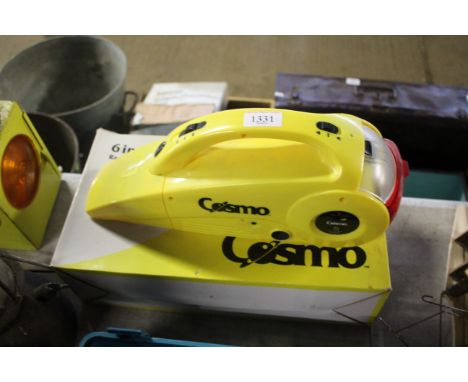 A Cosmo 6 in 1 auto helper (vacuum cleaner, compressor, spot light, hazard light, power bank etc) with original box