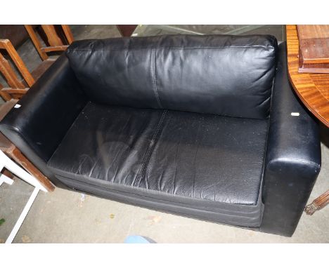 A leatherette upholstered sofa bed 