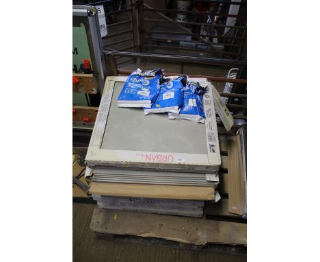 Ten packets of five urban style floor tiles 60cm x 60cm and three packets of Larsen tile grout