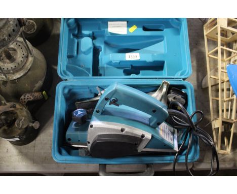 A Boschmann 240 volt electric planer in fitted plastic case together with instruction manual and accessories