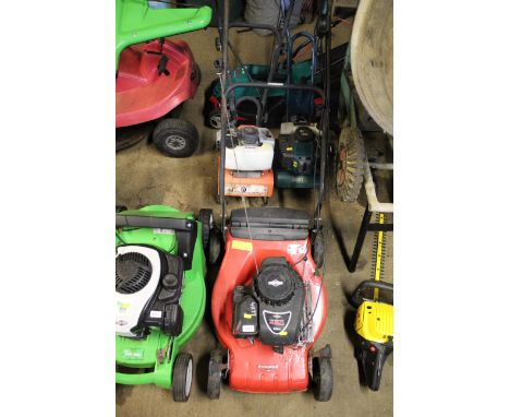 A Champion rotary garden lawn mower with Briggs & Stratton 450 series engine lacking grass collection box