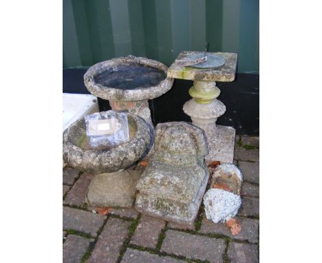 A garden sundial, bird bath etc