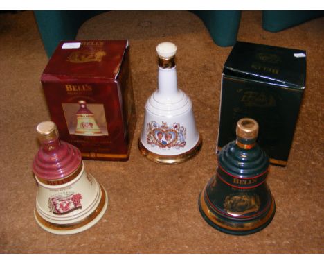An unopened Bell's Scotch Whisky decanter in original box together with one other and one without box