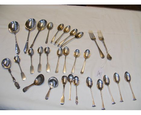 A tray of silver flatware