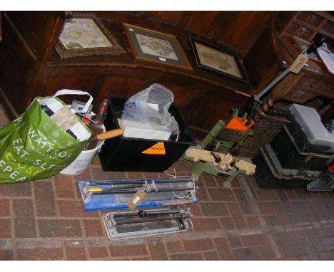 A selection of useful tools including corner tile cutter etc.