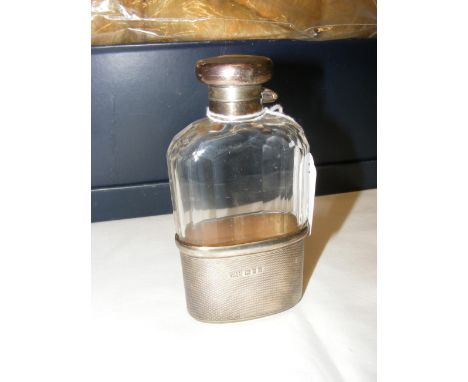 A silver mounted hip flask