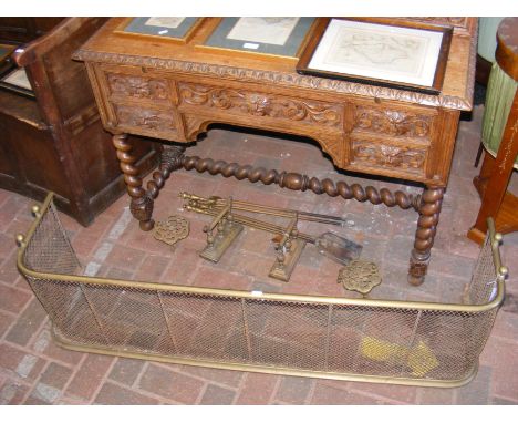 An antique fire fender together with tools