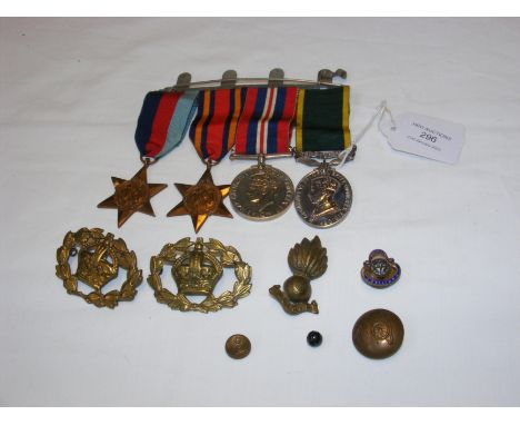 Second World War medals, military badges CONDITION REPORT To our eye, the inscription on the green ribboned medal reads:87992
