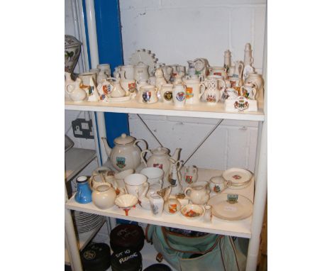 Goss and other crested ware - on two shelves