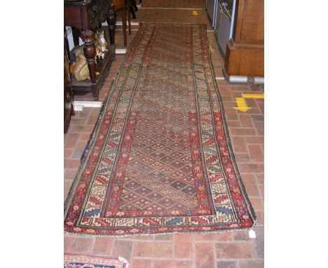 An antique Middle Eastern style runner - 370cm x 106cm