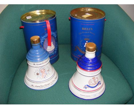 An unopened Bell's Scotch Whisky decanter in original tin, together with one other