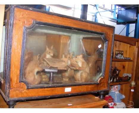 An antique Victorian taxidermy scene of five squirrels playing cards  CONDITION REPORT We have attached a number of additiona