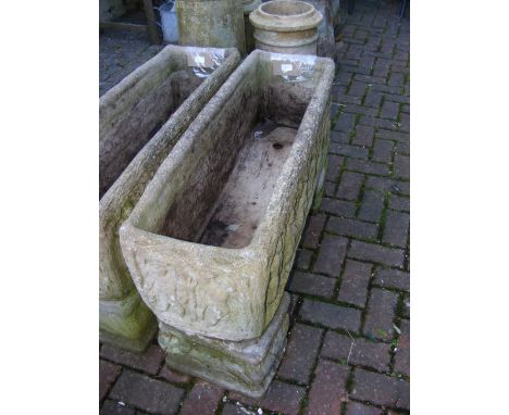 A decorative garden rectangular trough on stand 