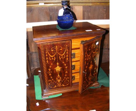 An Edwardian inlaid collectors cabinet having five drawers to the interior with sunken brass handles - 42cm x 42cm CONDITION 