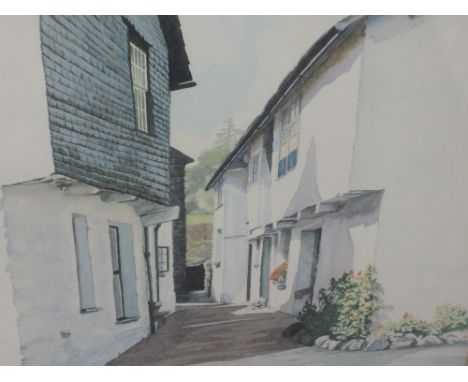 A watercolour, T Leslie Hawkes, Flag Street, Hawkshead, signed, attributed and dated (1974) verso  19'x15' and a watercolour 