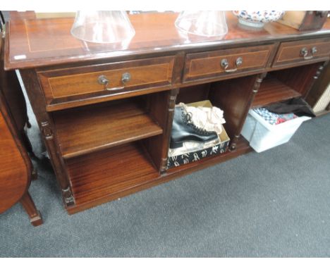 A late 20th century mahogany period style side cabinet/shelf unit