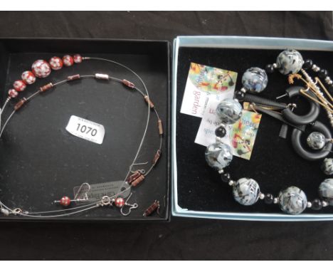 A small selection of costume jewellery including Wireworks & Carrie Elspeth necklaces, Magic Garden bead necklace etc