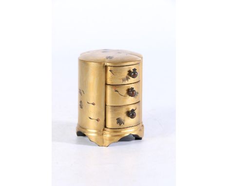 Chinese gilt lacquered three drawer trinket cabinet with stork decorated body, 8cm tall. 