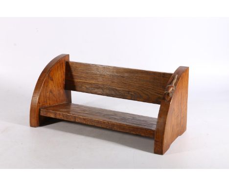 In the manner of Robert 'Mouseman' Thompson of Kilburn, an oak book trough with mouse signature, 46cm long.